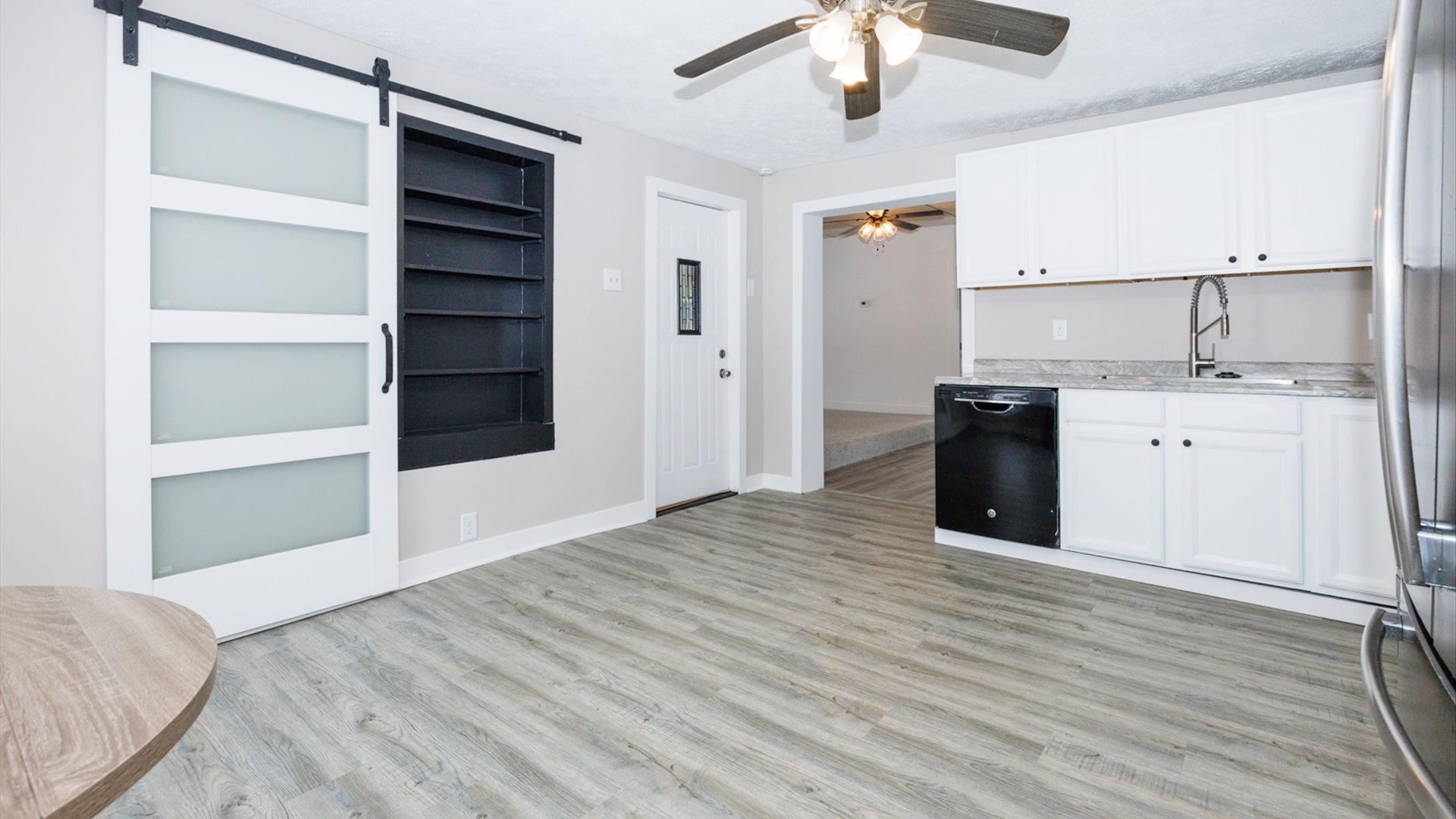 300 East South Street Atlanta, IL 61723 - Photo 13 of 69 a view of kitchen with wooden floor and electronic appliances