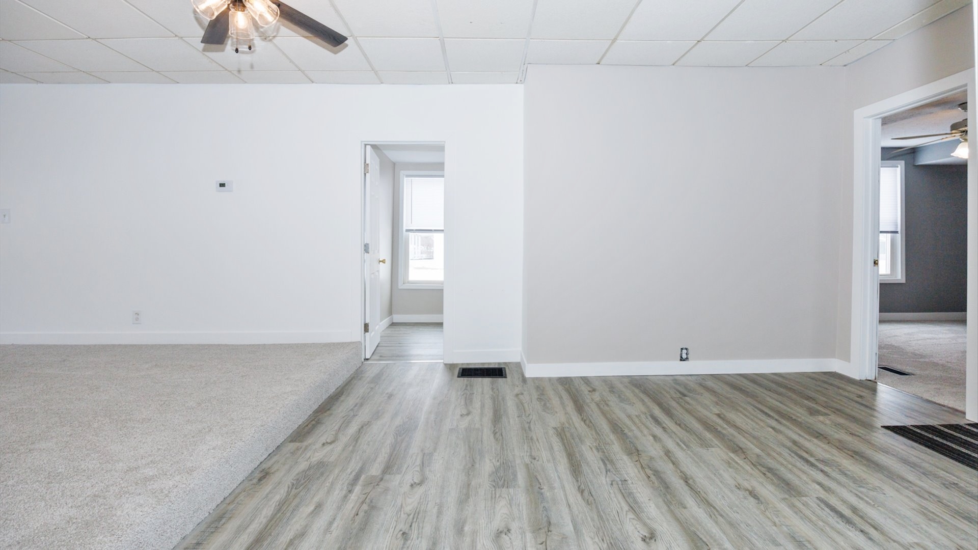 300 East South Street Atlanta, IL 61723 - Photo 25 of 69 a view of a room with wooden floor and a ceiling fan