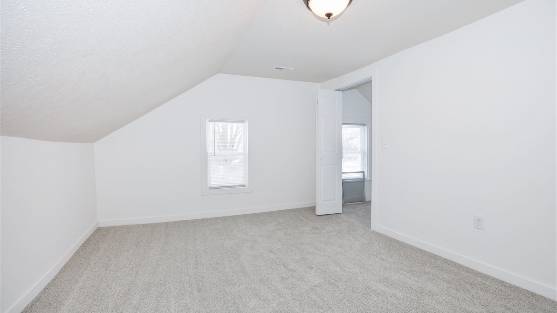 300 East South Street Atlanta, IL 61723 - Photo 36 of 69 a view of an empty room with a window