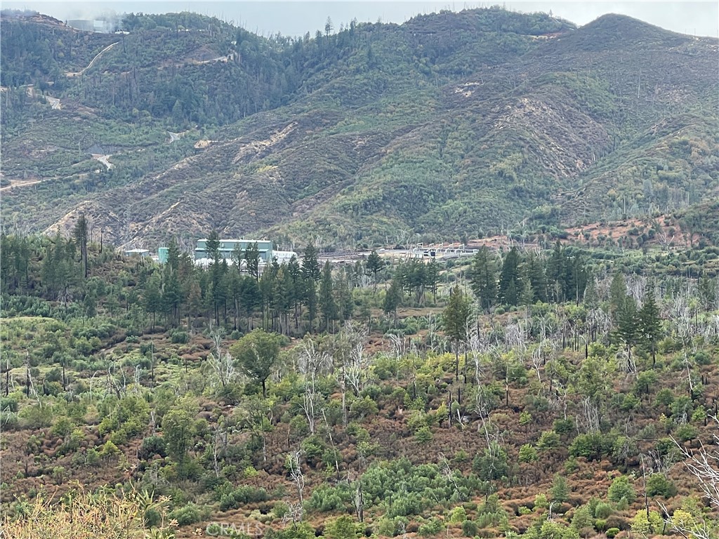 17655 Ford Flat Road Middletown, CA 95461 - Photo 12 of 15 a view of a lake with mountains in the background