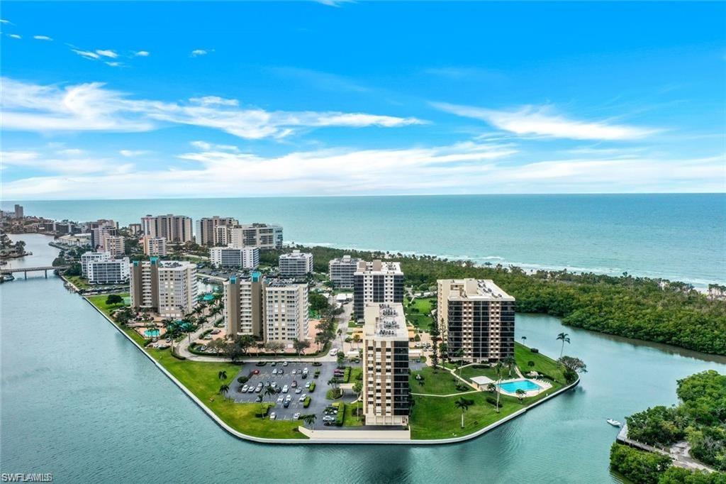 17 Bluebill Avenue, Unit 206 Naples, FL 34108 - Photo 44 of 44 a view of a lake with a city