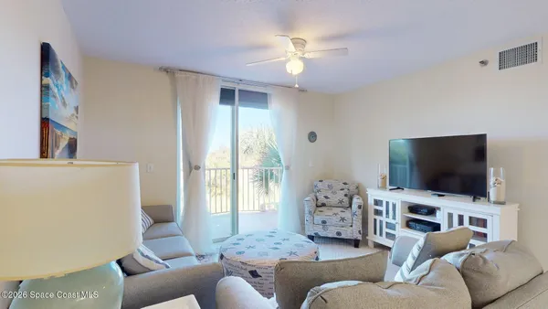 a kitchen with cabinets stainless steel appliances a sink and a window