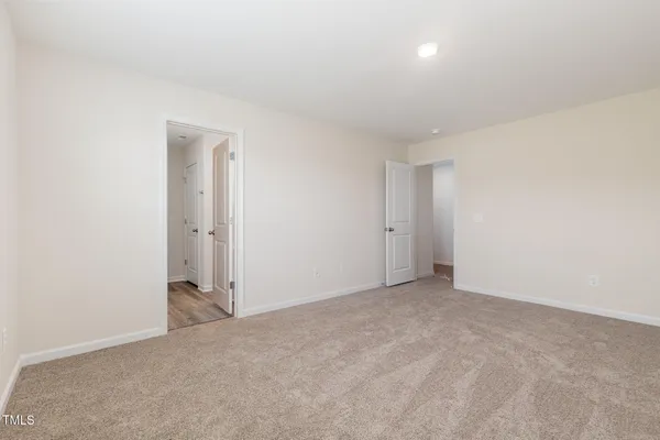 an empty room with an entryway