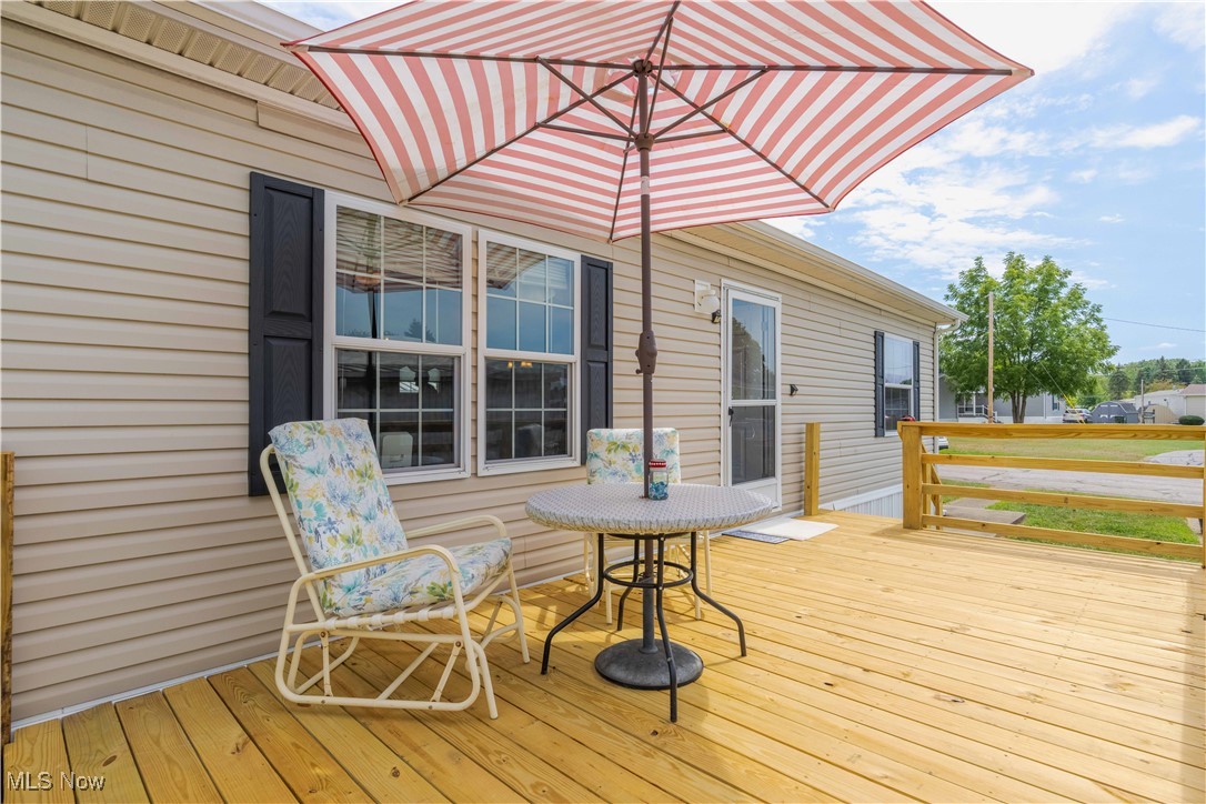 18592 Edwards Road, Unit 156 Doylestown, OH 44230 - Photo 5 of 33 Large deck constructed in 2025