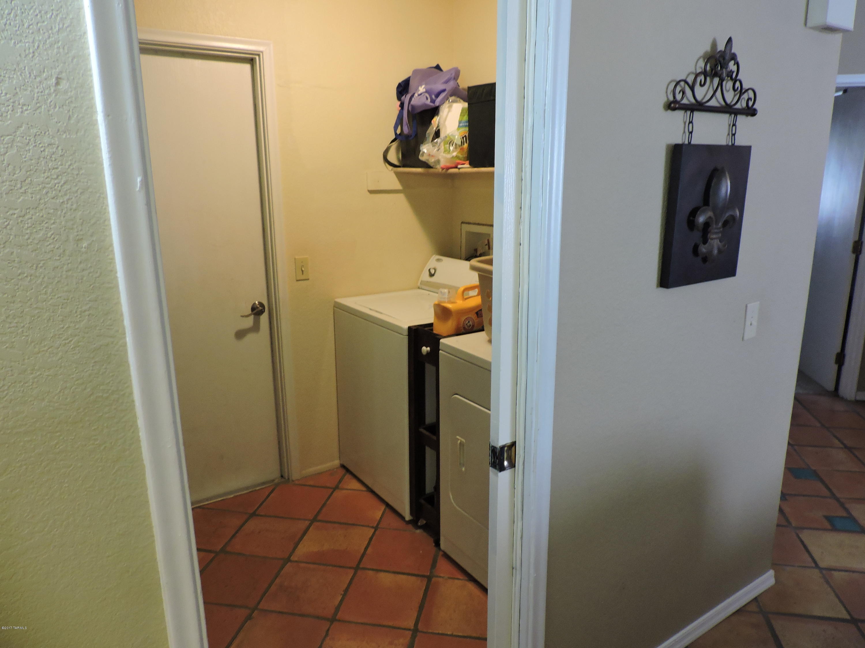 2709 West Firebrook Road Tucson, AZ 85741 - Photo 6 of 17 a hallway with kids room
