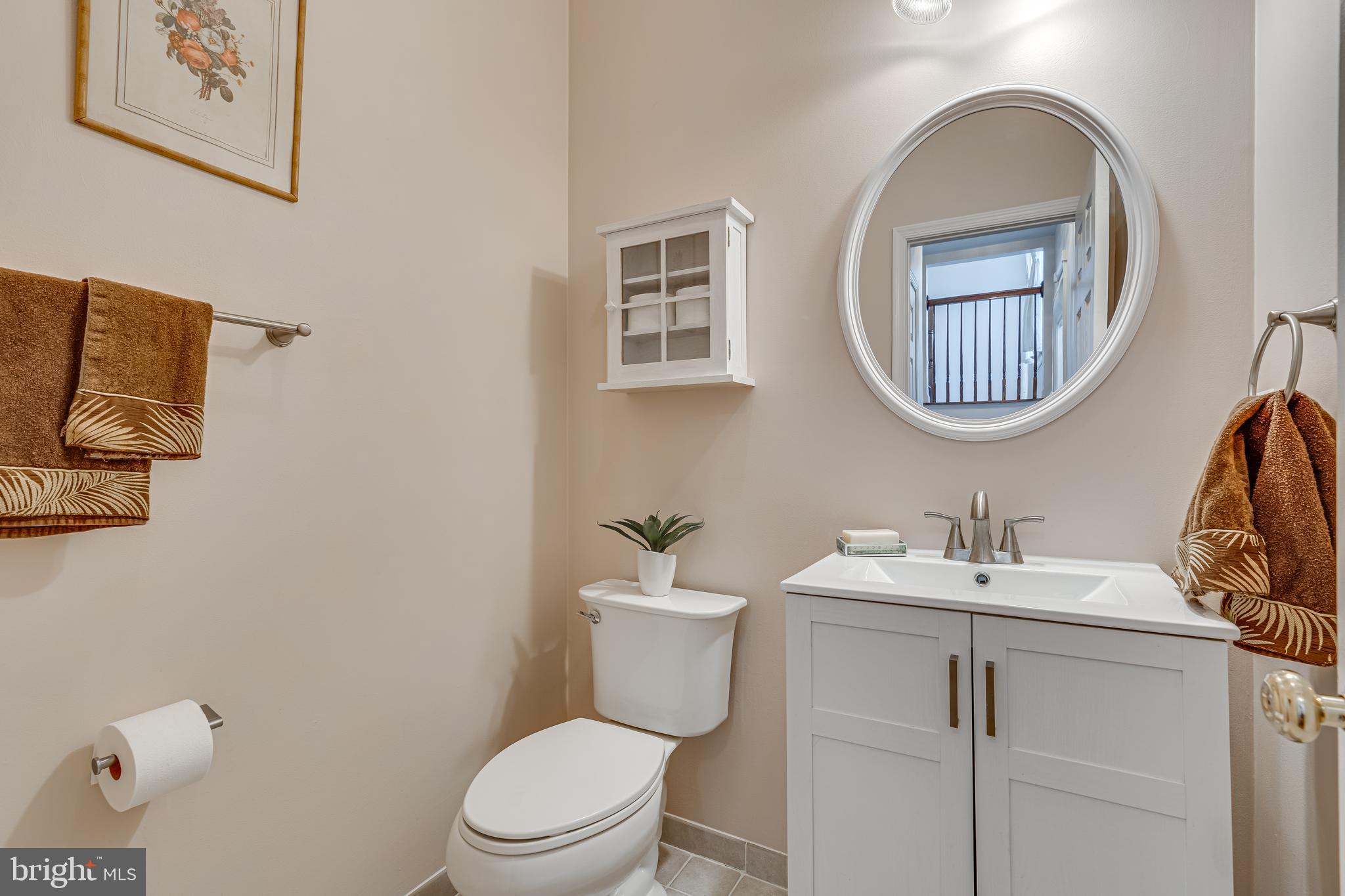 13406 Lore Pines Lane Solomons, MD 20688 - Photo 20 of 50 main level powder room