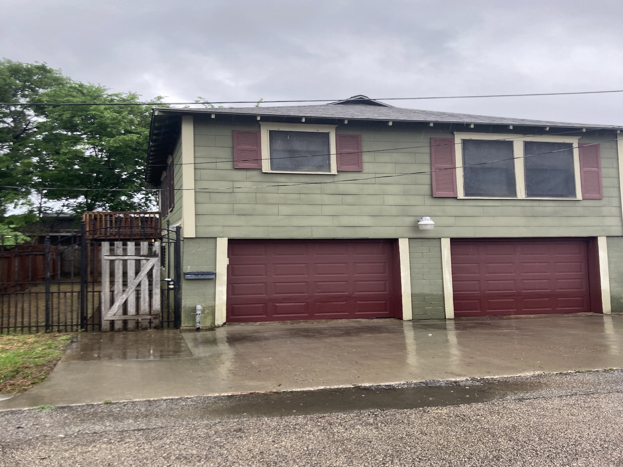 4921 Maxie Street, Unit 1/2 Houston, TX 77007 - Photo 14 of 14 a front view of a house with a yard