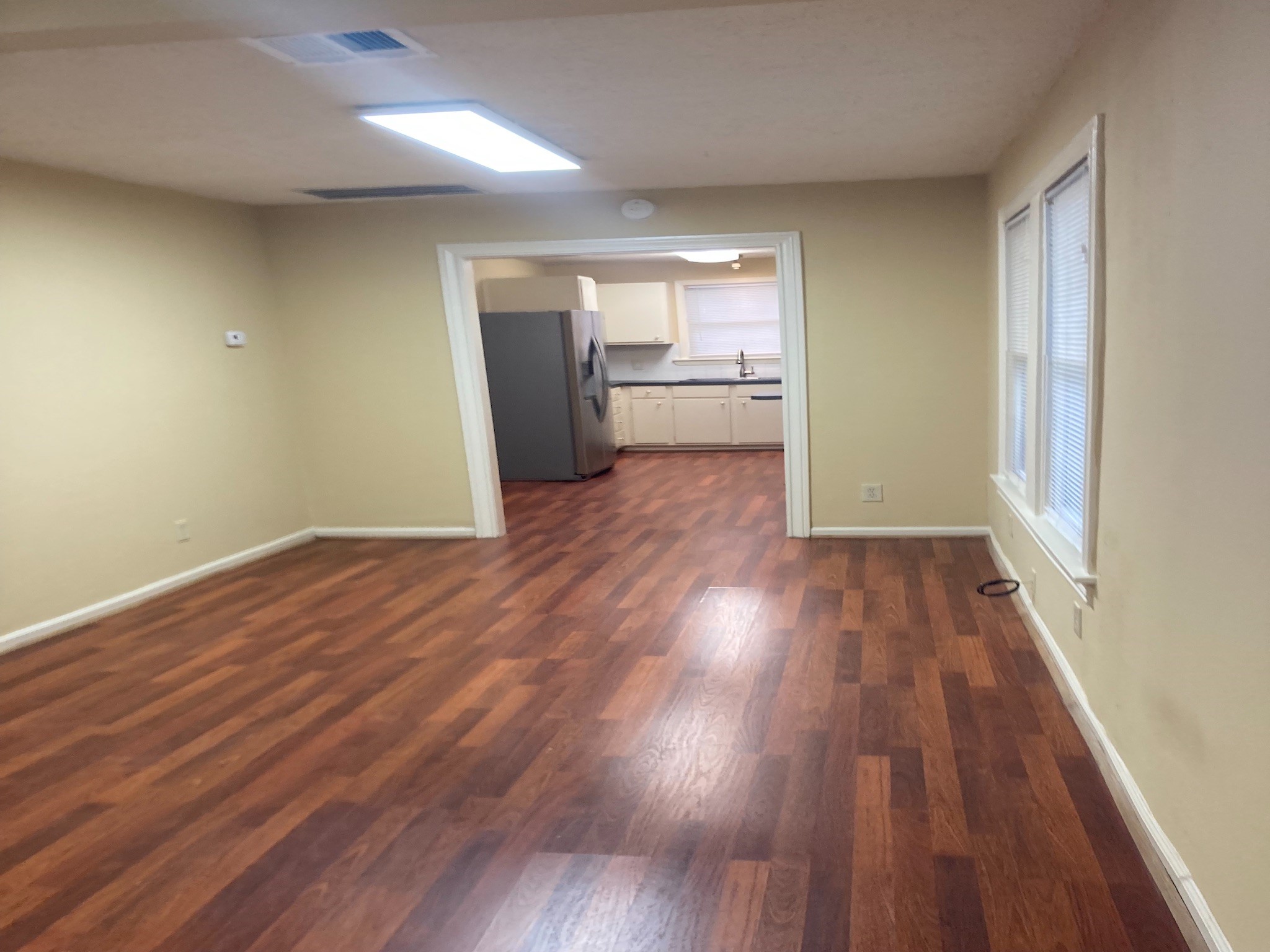 4921 Maxie Street, Unit 1/2 Houston, TX 77007 - Photo 8 of 14 a view of empty room with wooden floor