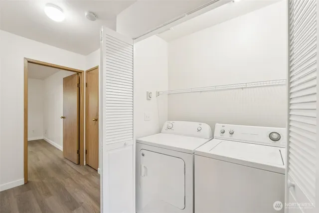 a utility room with dryer and washer