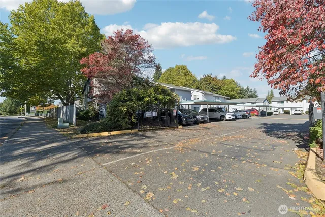a view of street with parked cars