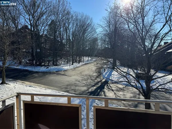 a view of a backyard of the house