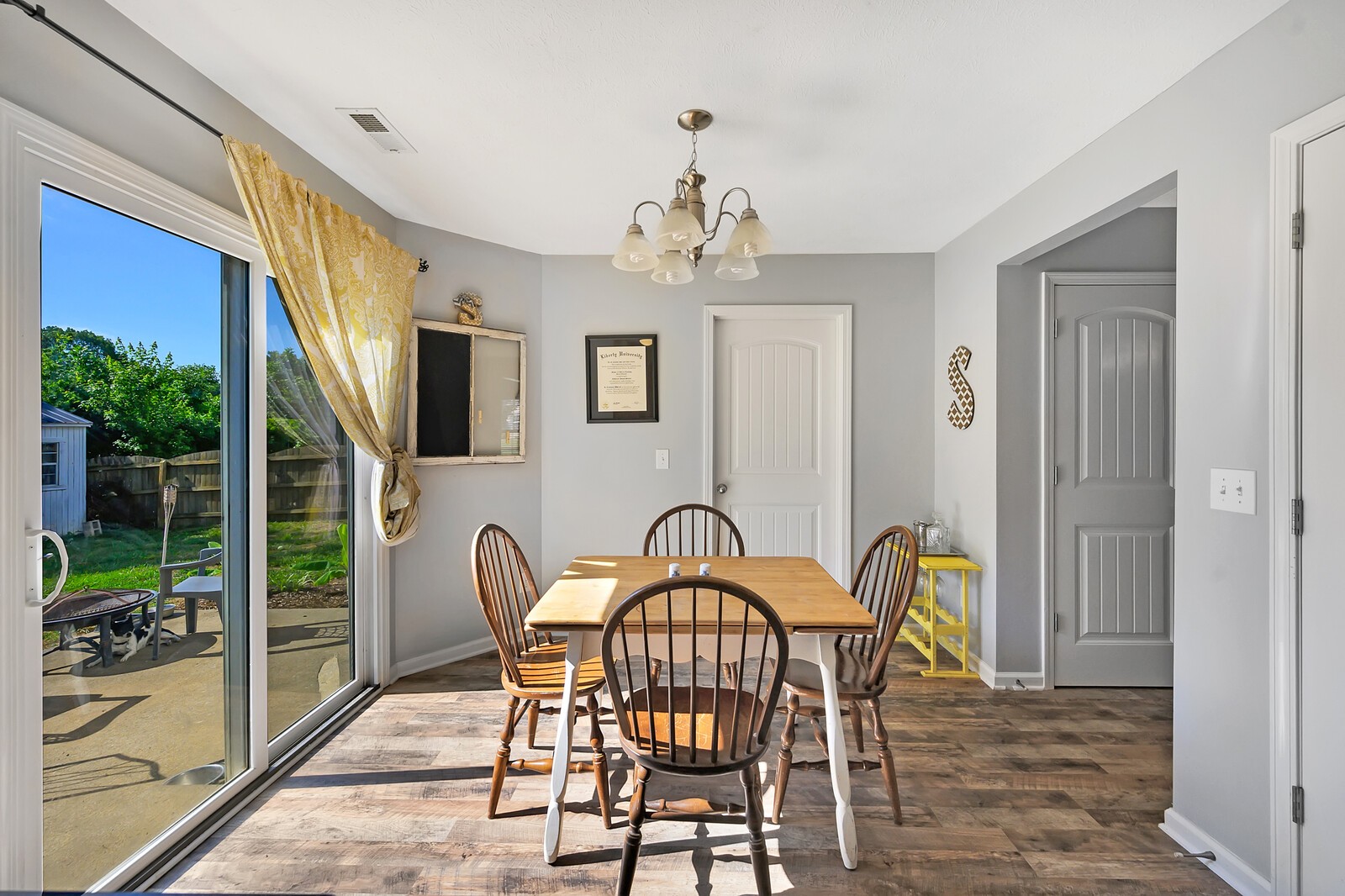 1129 Woodall Road Lebanon, TN 37090 - Photo 7 of 12 a view of a dining room with furniture window and wooden floor