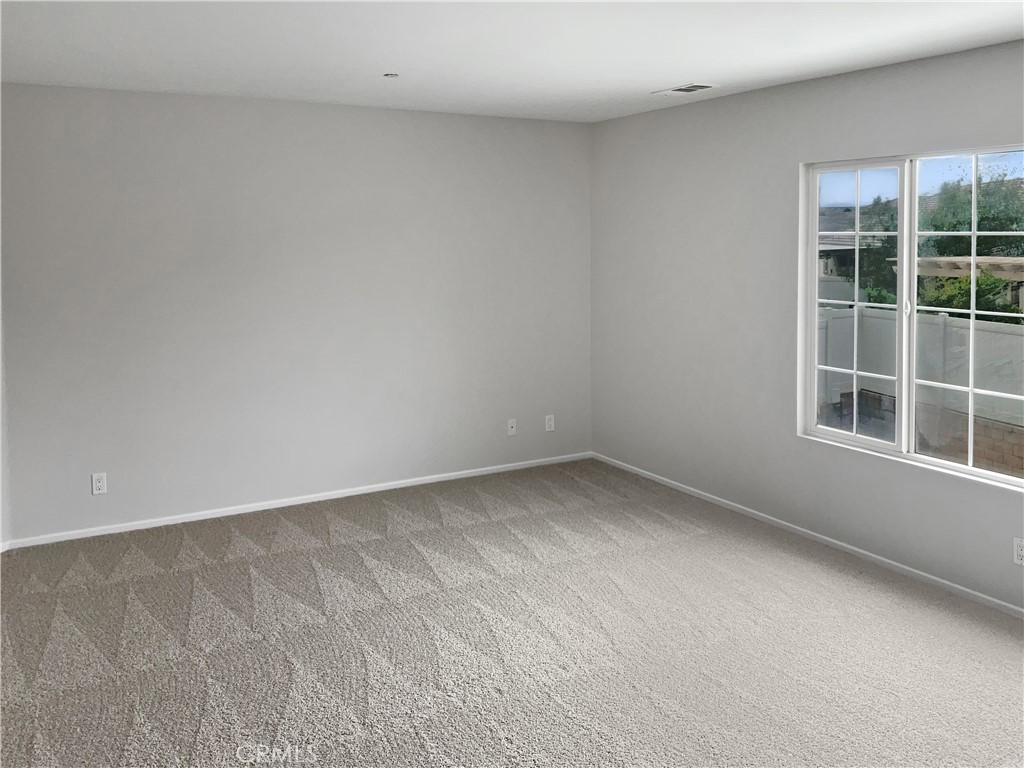 1966 Echo Road San Jacinto, CA 92582 - Photo 14 of 23 a view of an empty room with a window