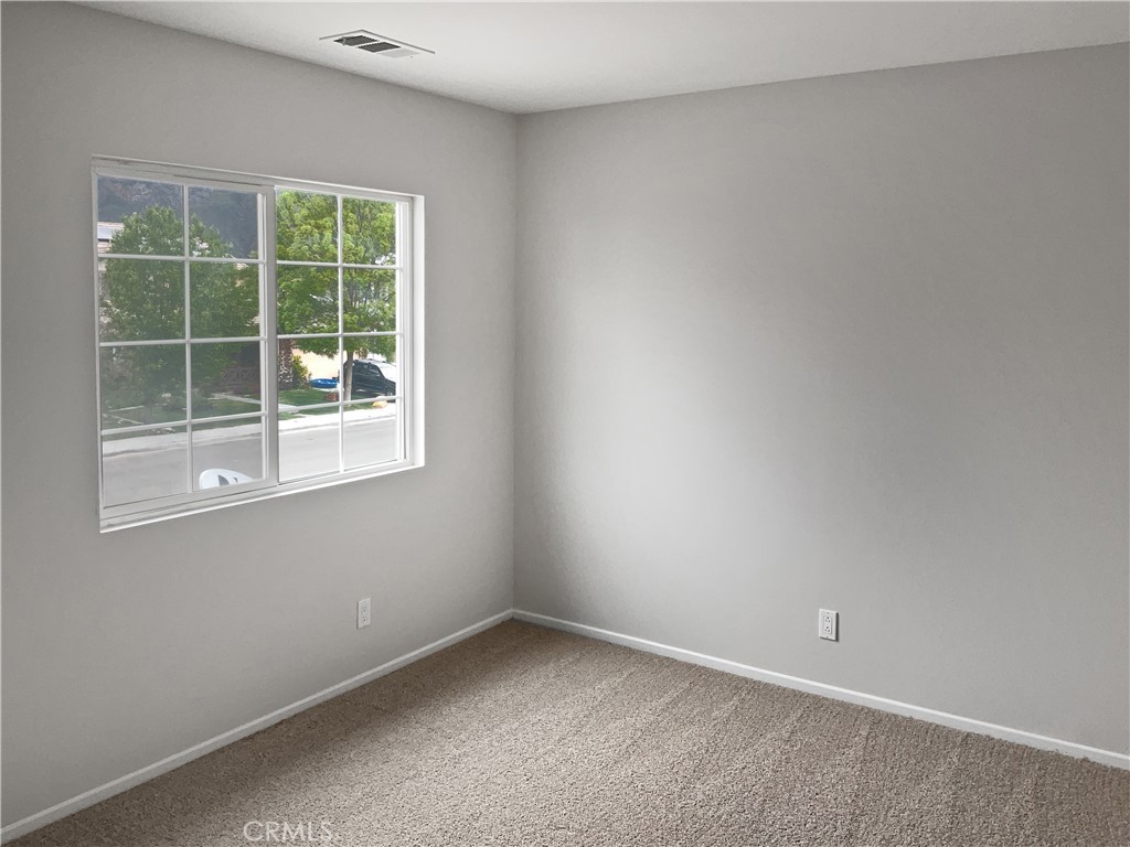 1966 Echo Road San Jacinto, CA 92582 - Photo 16 of 23 an empty room with a window