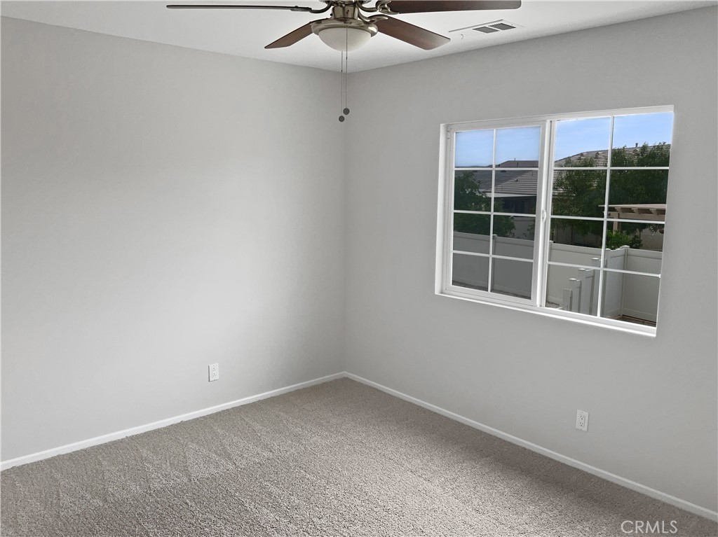 1966 Echo Road San Jacinto, CA 92582 - Photo 18 of 23 an empty room with a window