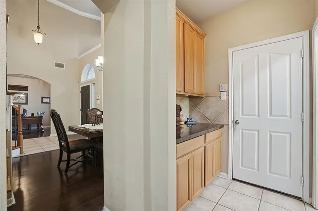 a view of a hallway with workspace