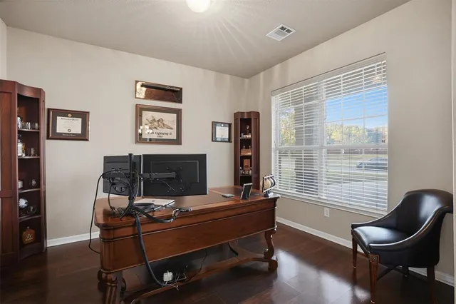 a room with furniture and windows
