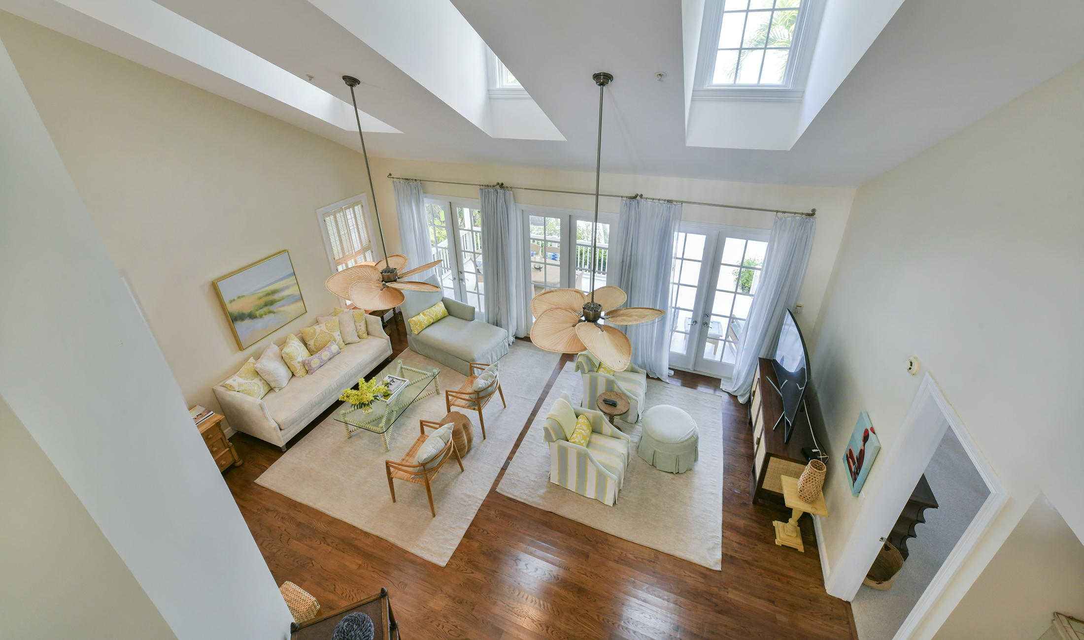 5 Sunset Key Drive Key West, FL 33040 - Photo 11 of 37 a living room with furniture and a flat screen tv