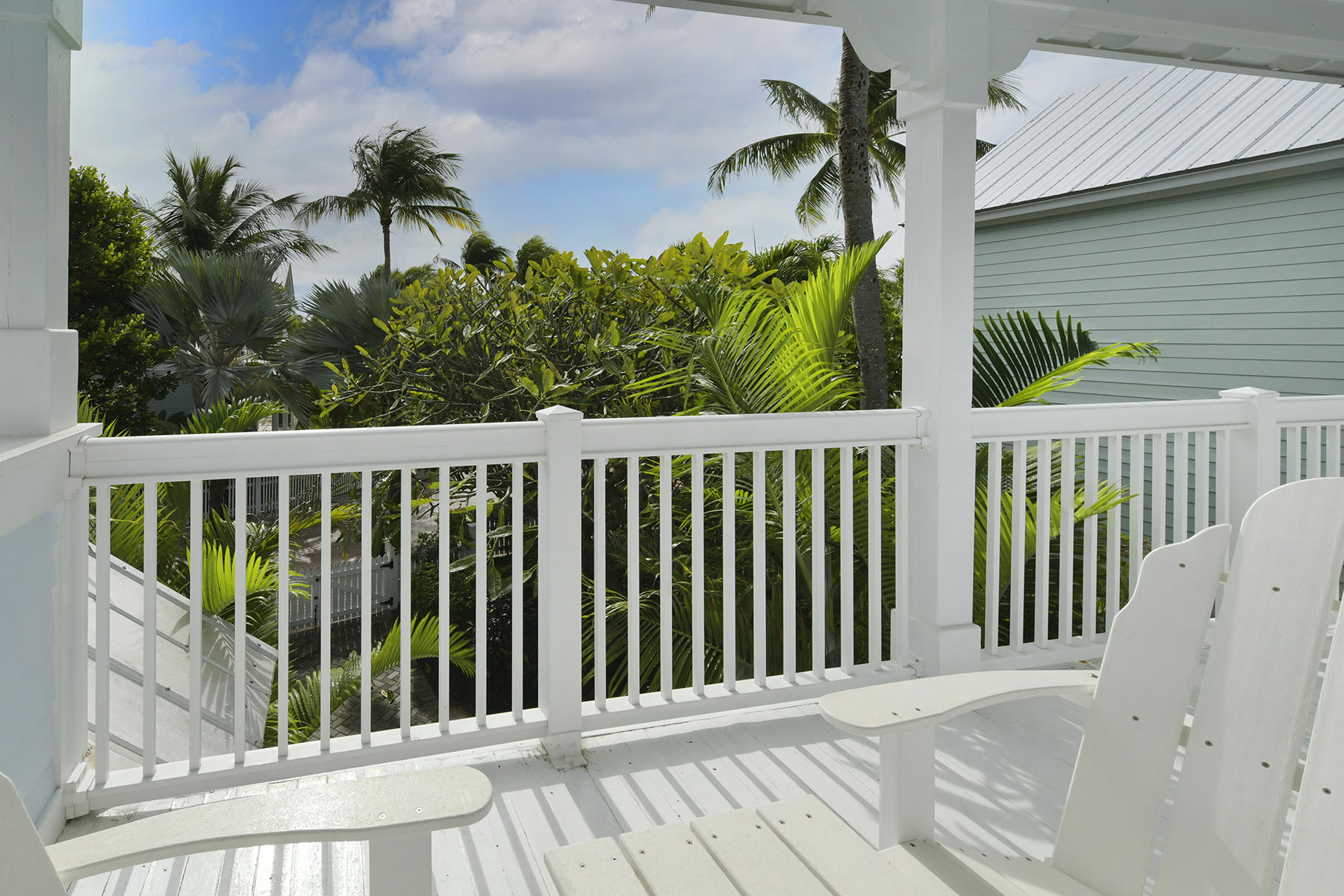 5 Sunset Key Drive Key West, FL 33040 - Photo 24 of 37 a view of a wooden fence and a porch