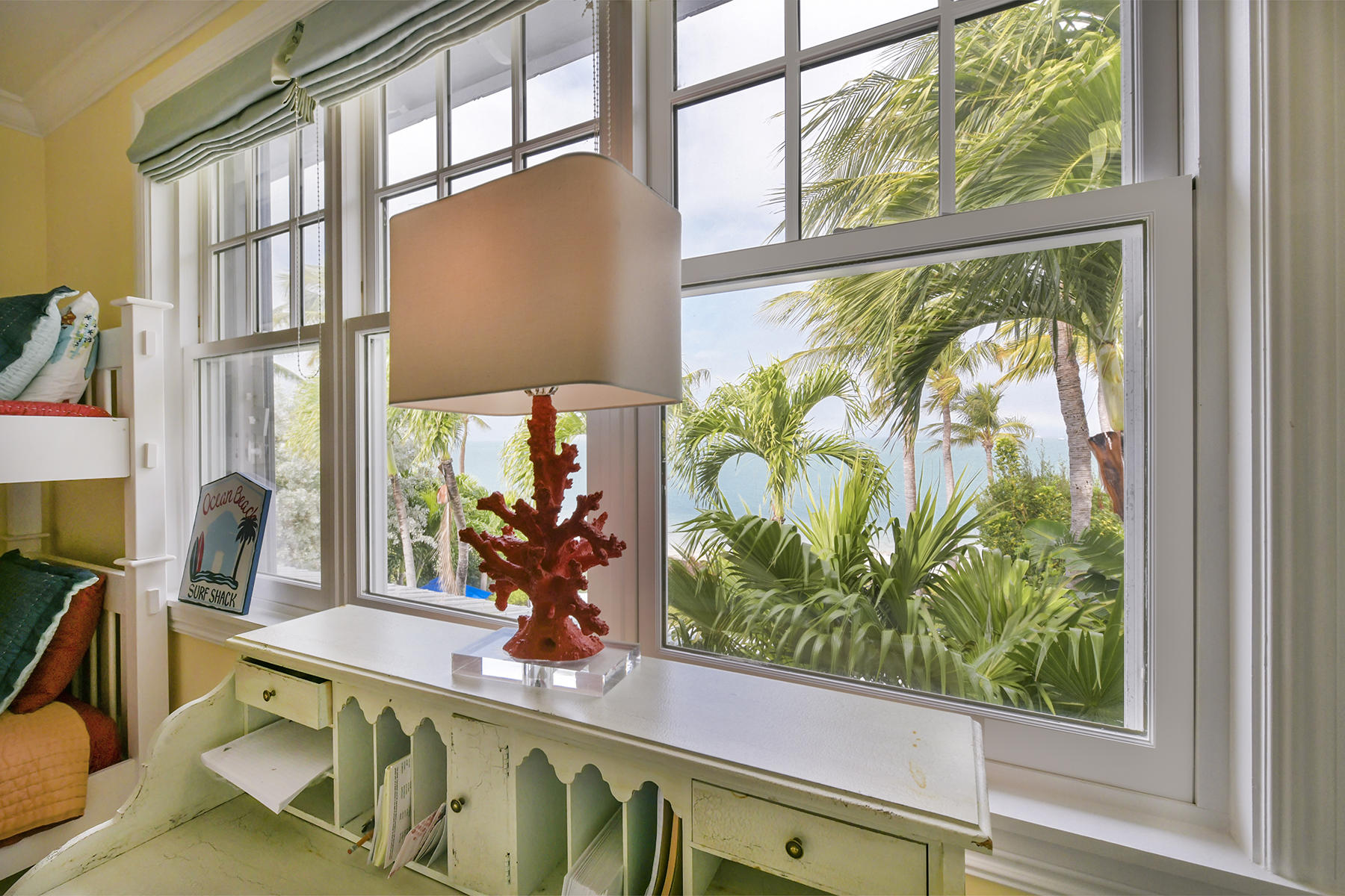 5 Sunset Key Drive Key West, FL 33040 - Photo 26 of 37 a view of a living room and floor to ceiling window