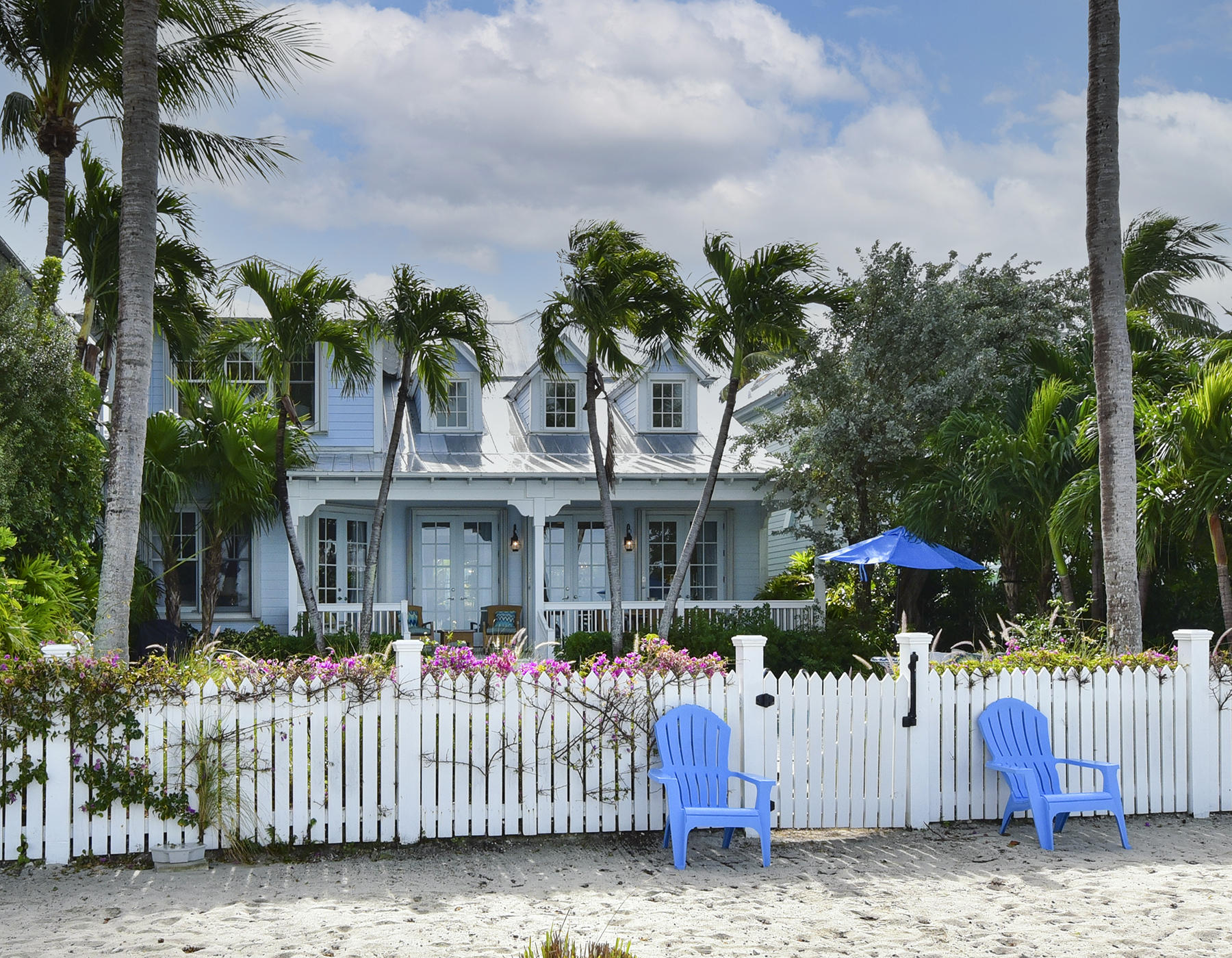 5 Sunset Key Drive Key West, FL 33040 - Photo 30 of 37 a front view of a house with a garden