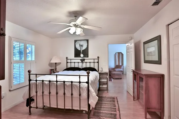 a view of a swimming pool with a patio