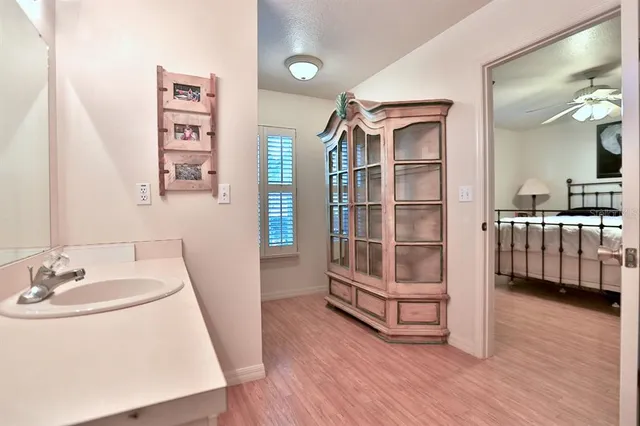 a view of a swimming pool with a patio