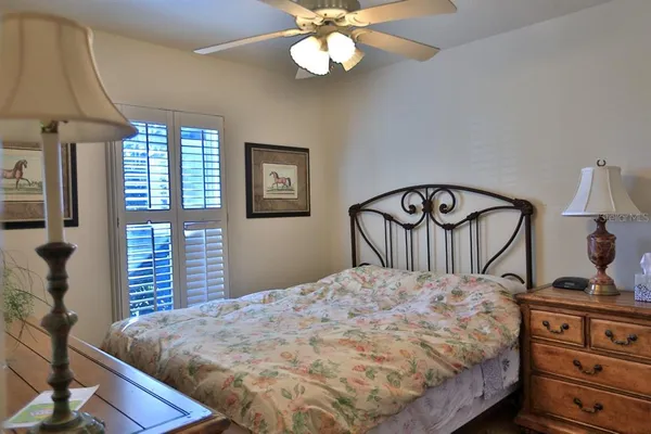a view of a swimming pool with sitting area