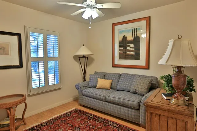 a bedroom with furniture and a bed