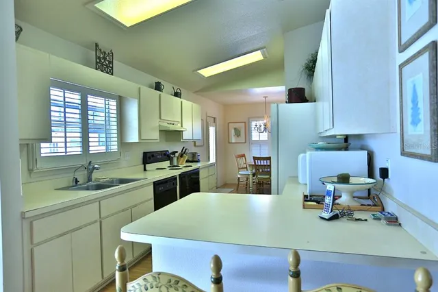 a bathroom with a sink toilet and mirror
