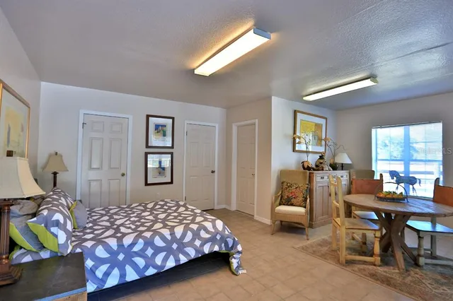 a view of staircase with lots of frames on wall