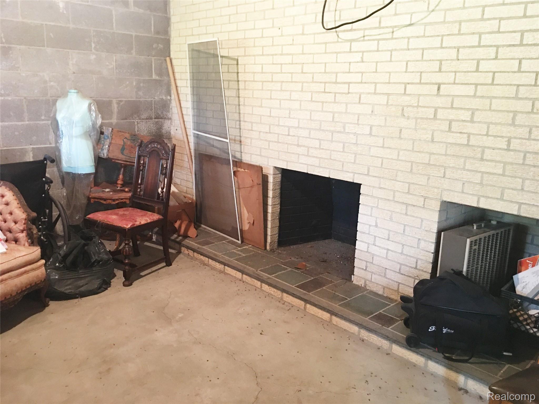 5836 Paint Valley Drive Rochester, MI 48306 - Photo 24 of 39 Natural Fireplace in W/O Basement