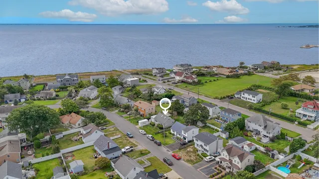 a picture of a bathroom with a picture of a refrigerator