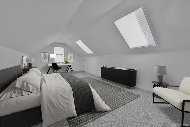 a bed room with a bed and a couch