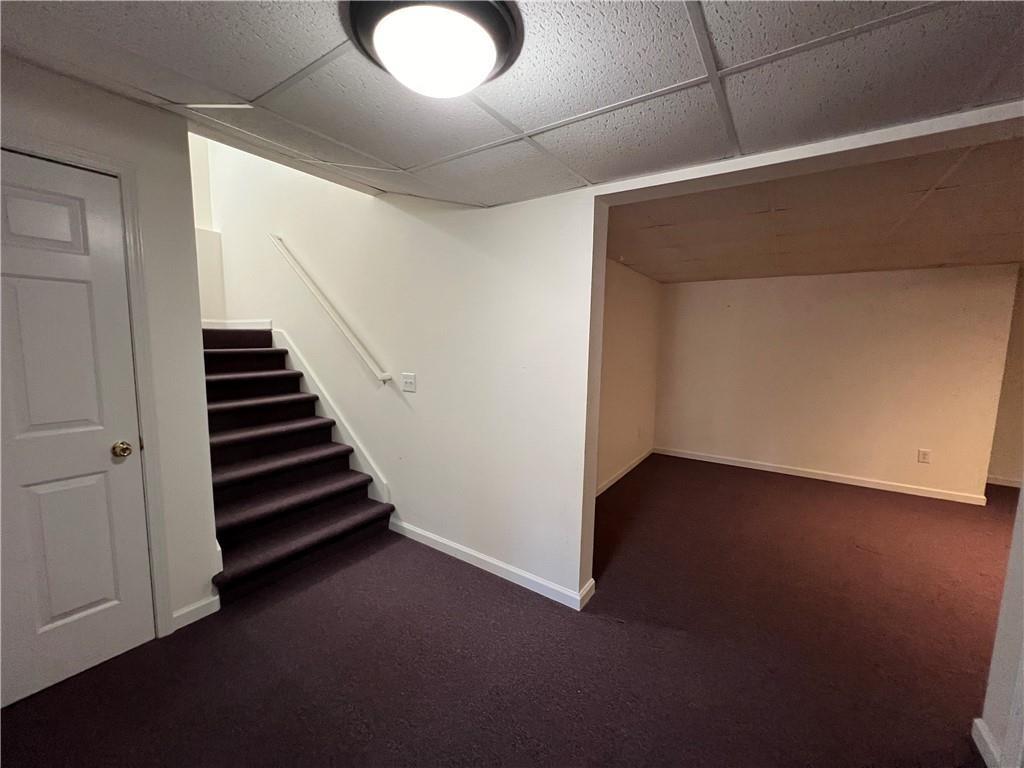 2550 Wellsley Lane Cumming, GA 30041 - Photo 19 of 22 a view of an empty room with stairs