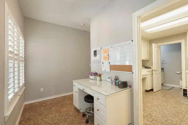 a kitchen that has a sink and a stove