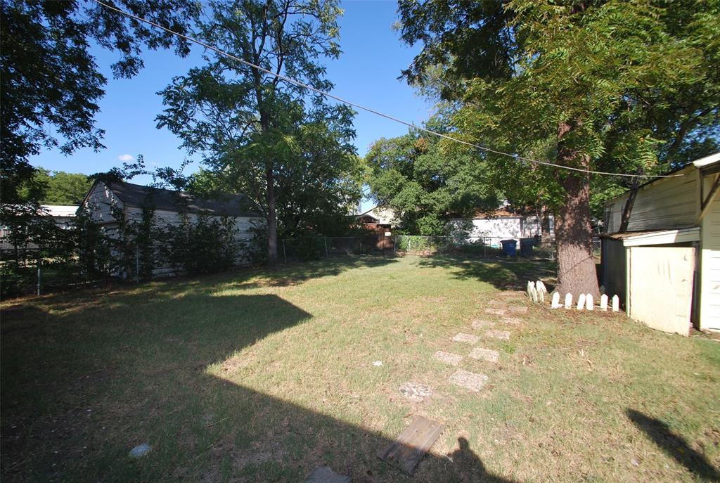 6918 Lockheed Avenue Dallas, TX 75209 - Photo 8 of 8 a view of a yard with a tree
