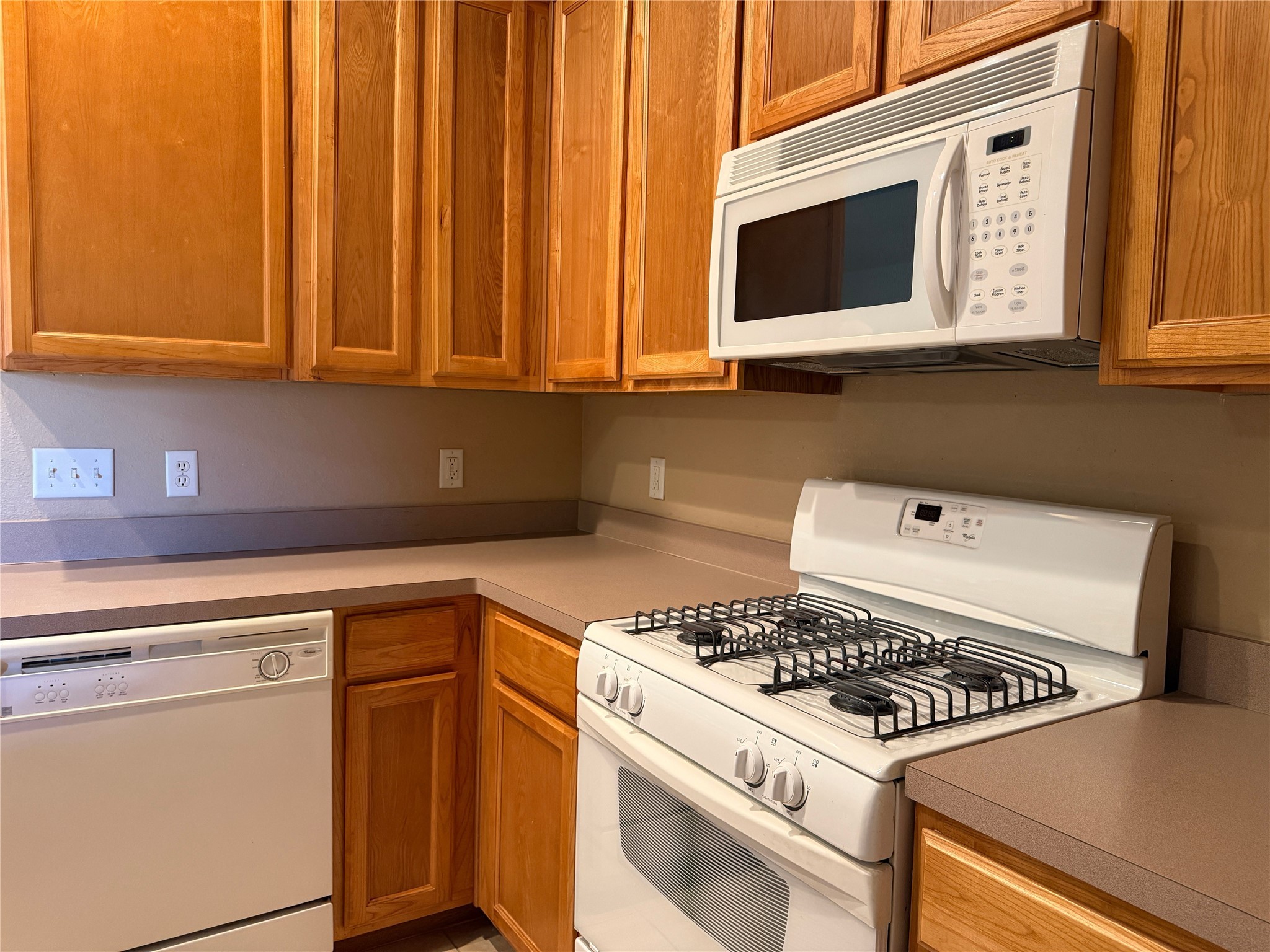 21608 Anvil Lane Porter, TX 77365 - Photo 16 of 42 Gas stove, dishwasher and microwave