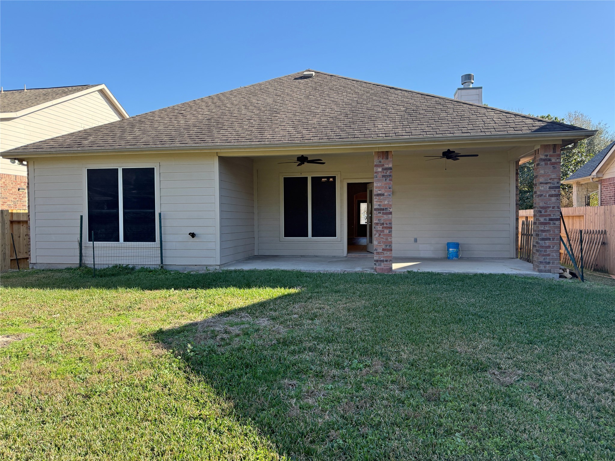 21608 Anvil Lane Porter, TX 77365 - Photo 22 of 42 Sit under the covered porch and watch your furbabies, friends, and family enjoy this great back yard.
