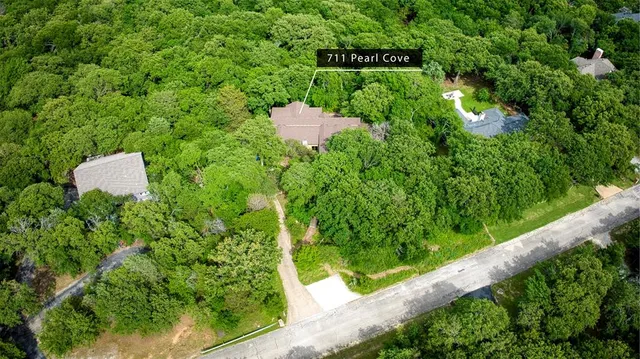 a view of a lake from a yard