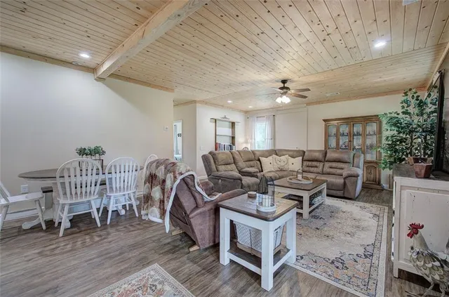 a dining room with furniture and window