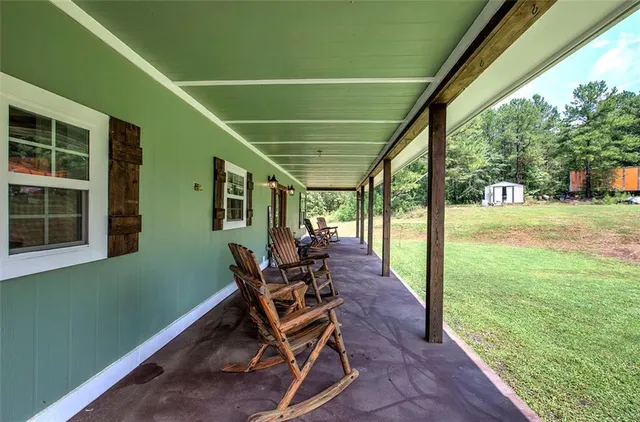 a view of a pathway both side of yard