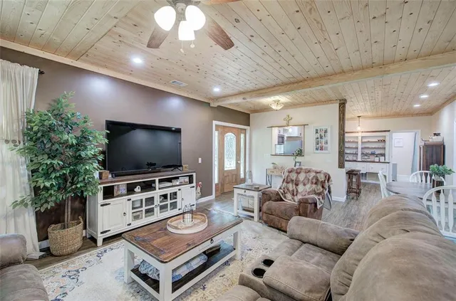 a utility room with cabinets washer and dryer
