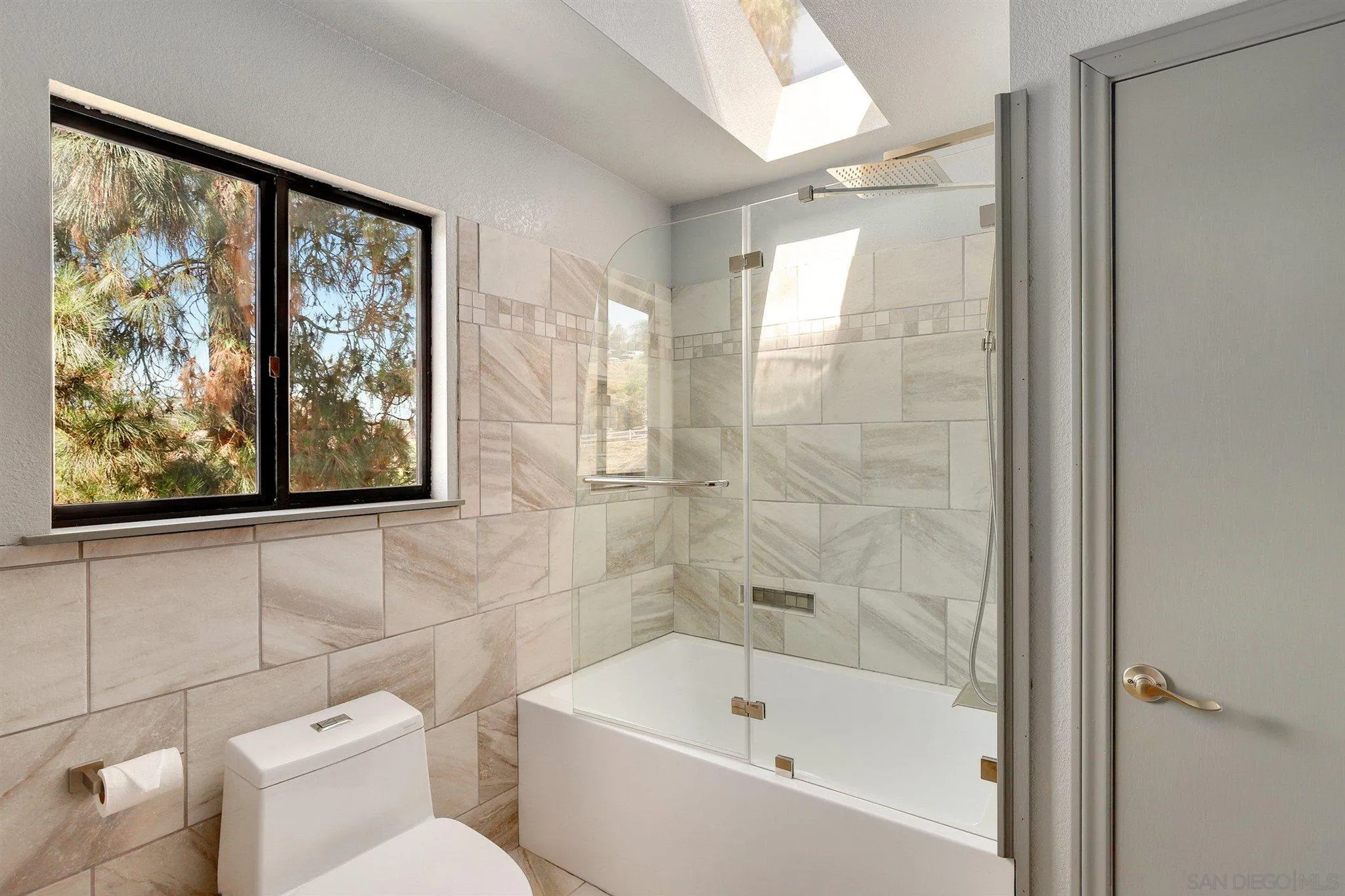 11846 Old Castle Road Valley Center, CA 92082 - Photo 12 of 37 a bathroom with a bathtub and a shower