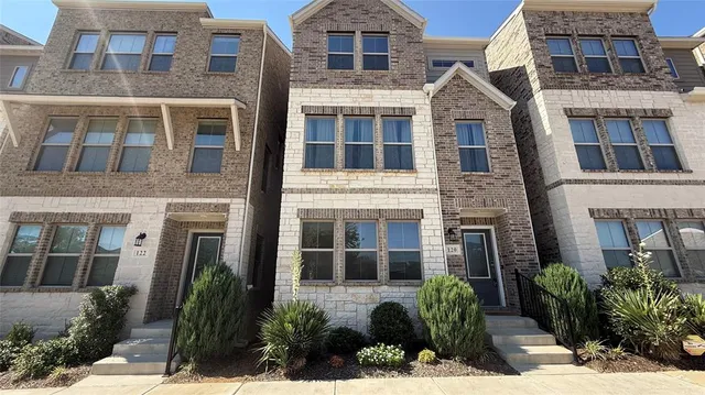 a front view of a multi story residential apartment building