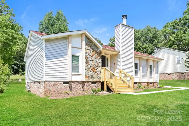 a front view of house with yard