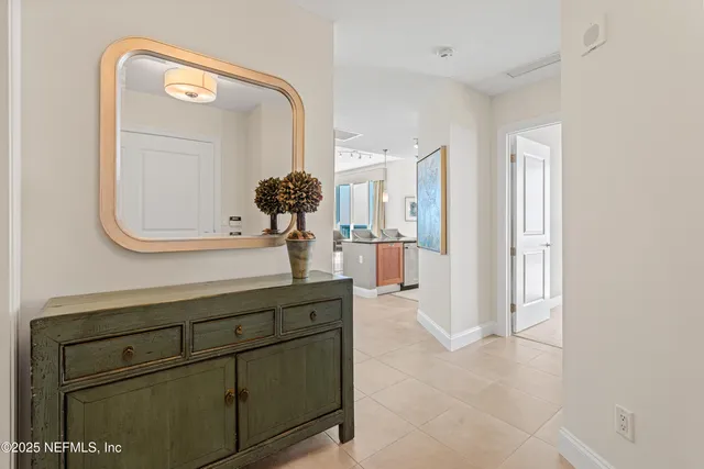 a bathroom with a sink a mirror and a shower