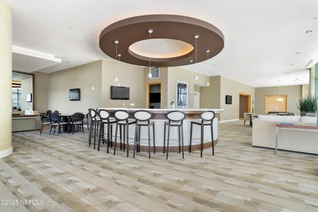 a view of a dining room with furniture