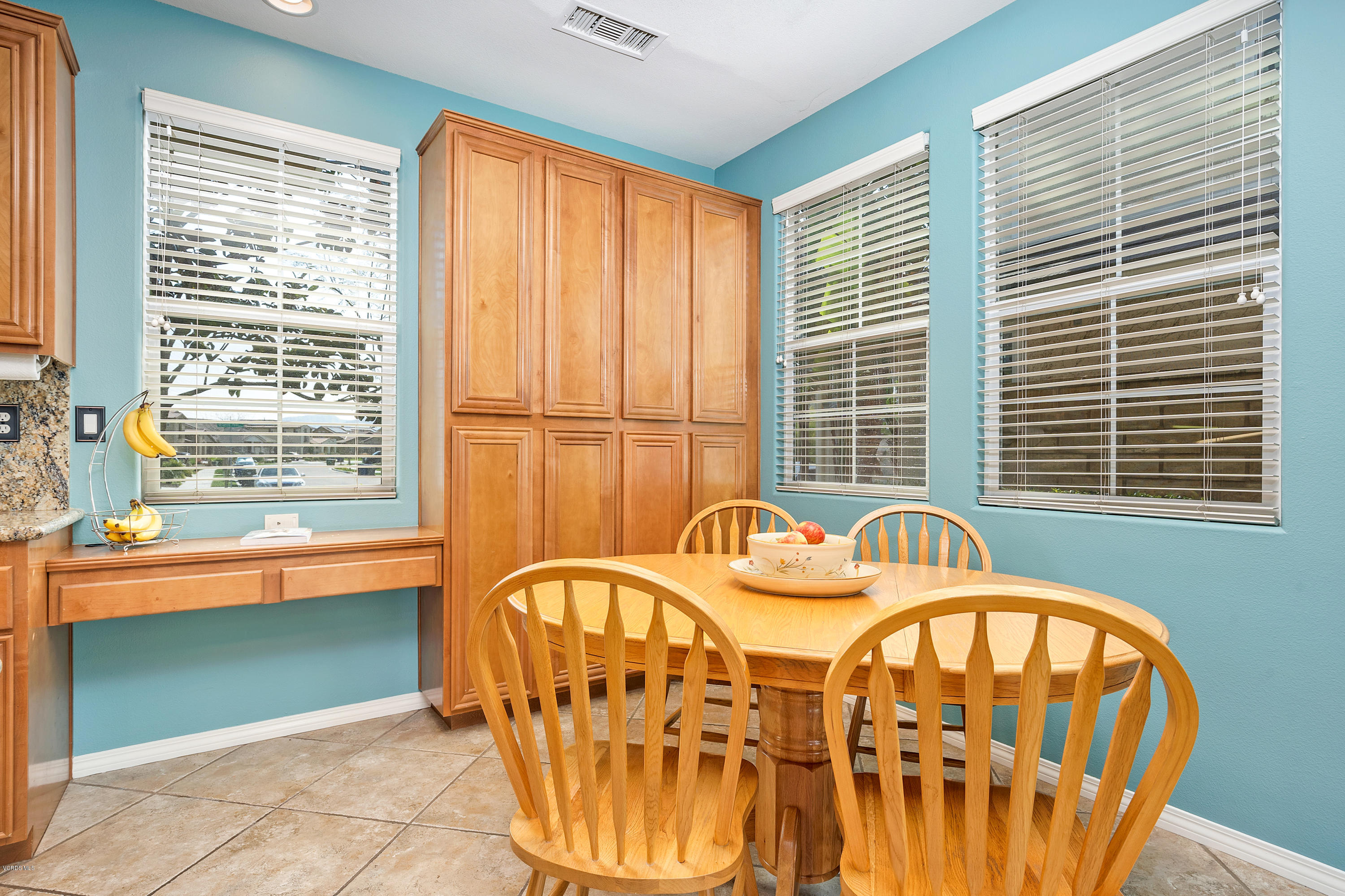 507 Spring Park Road Camarillo, CA 93012 - Photo 13 of 34 a view of a balcony a table and chairs
