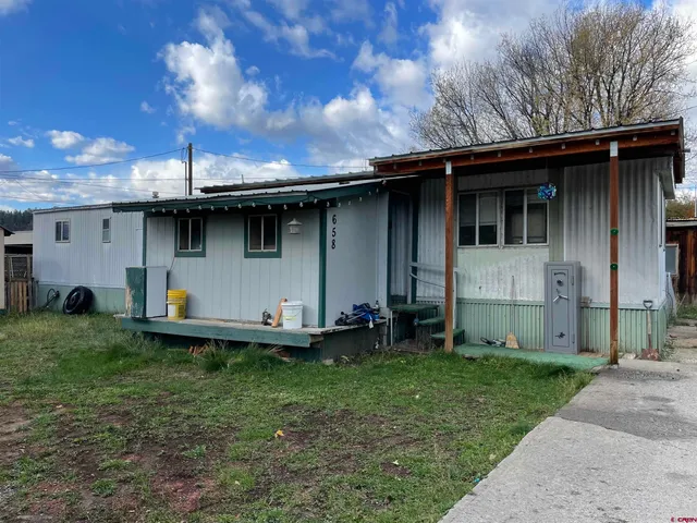 a front view of house with yard